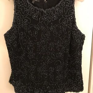Beaded fitted black top.